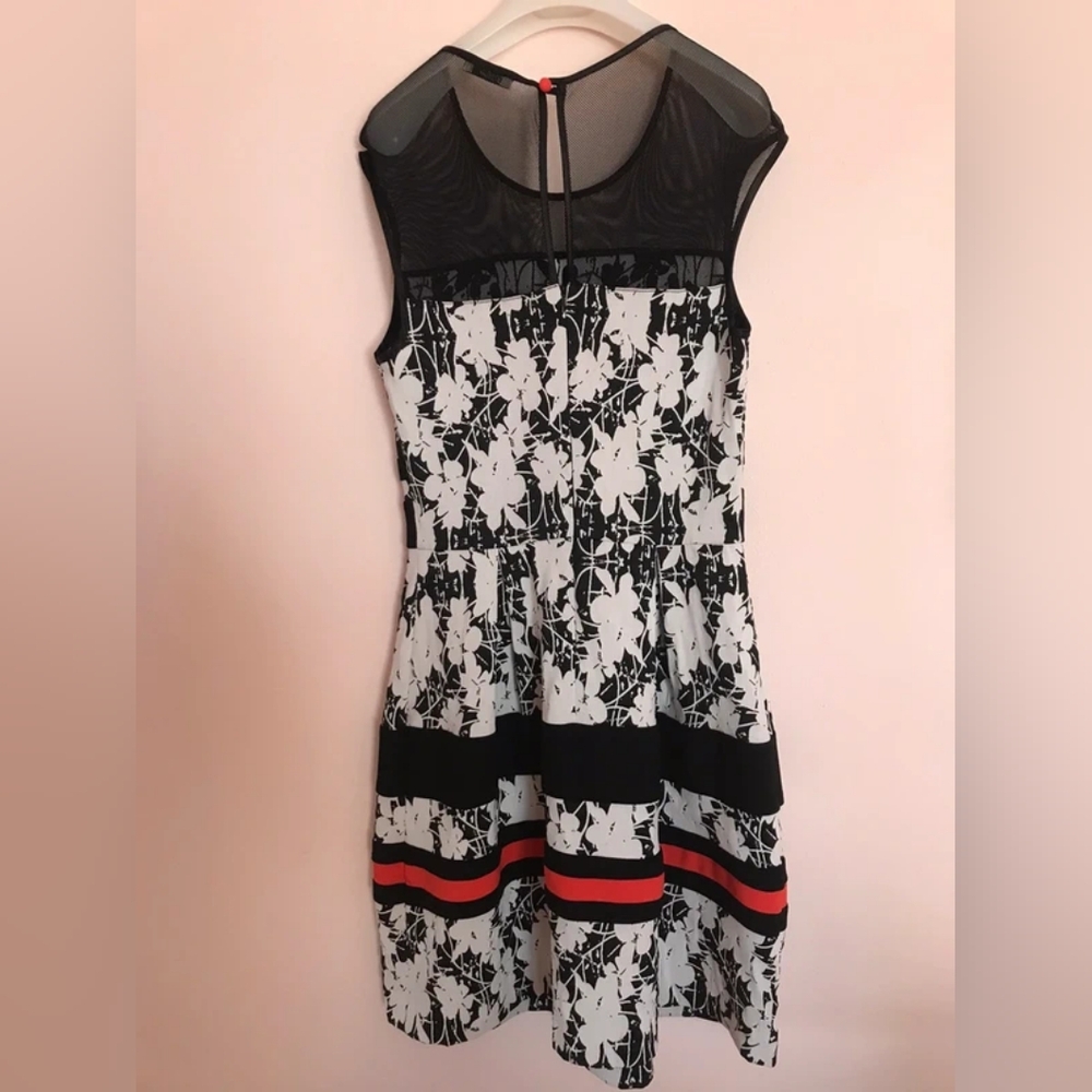 Elegant Black and White Floral Dress with Red Accents